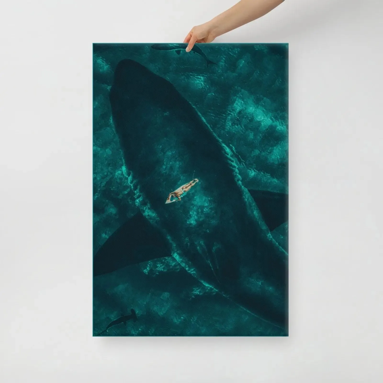 Beneath the Surface – Woman on a Surfboard Above a Massive Shark Canvas Print
