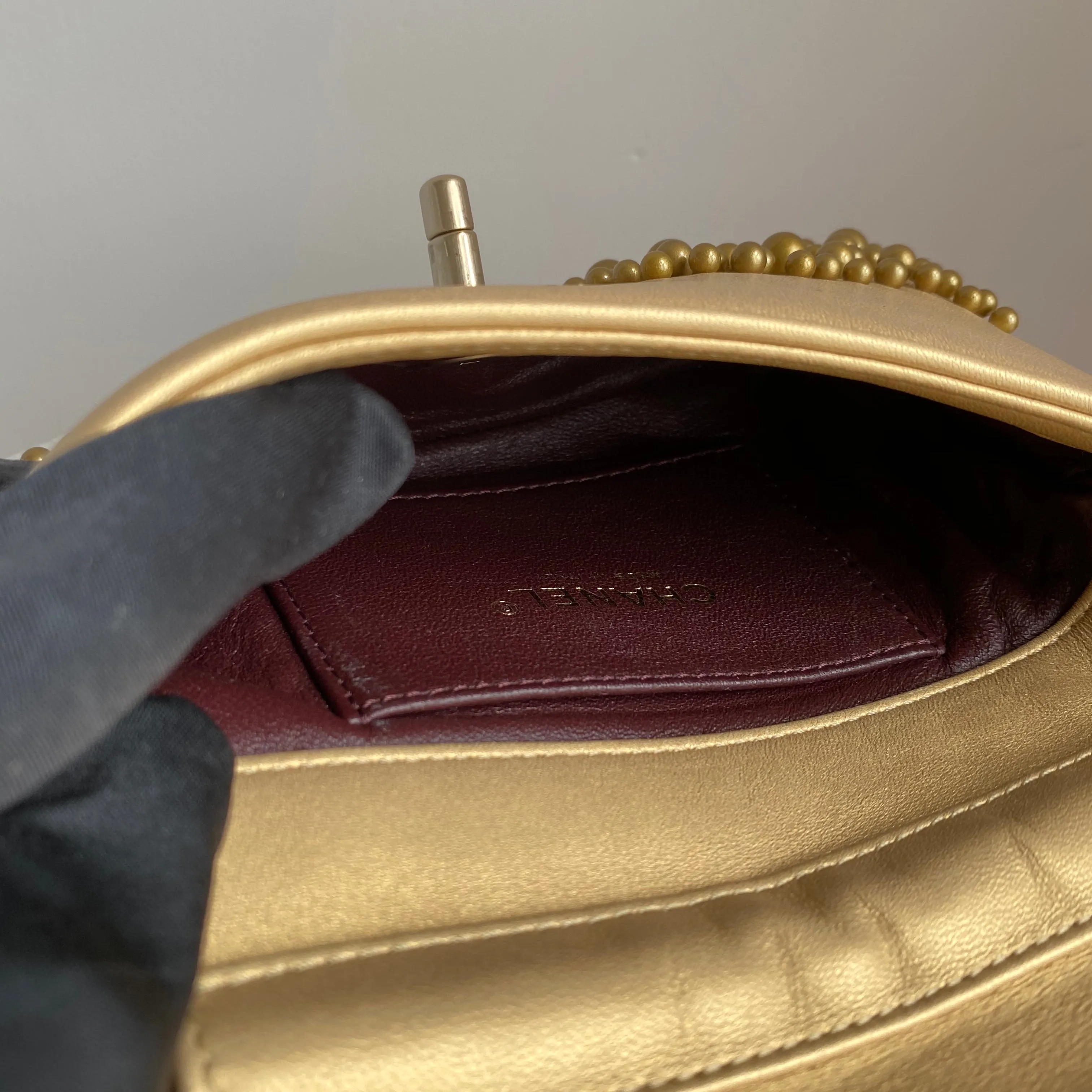 Gold Pearl Lambskin Mini Flap Bag