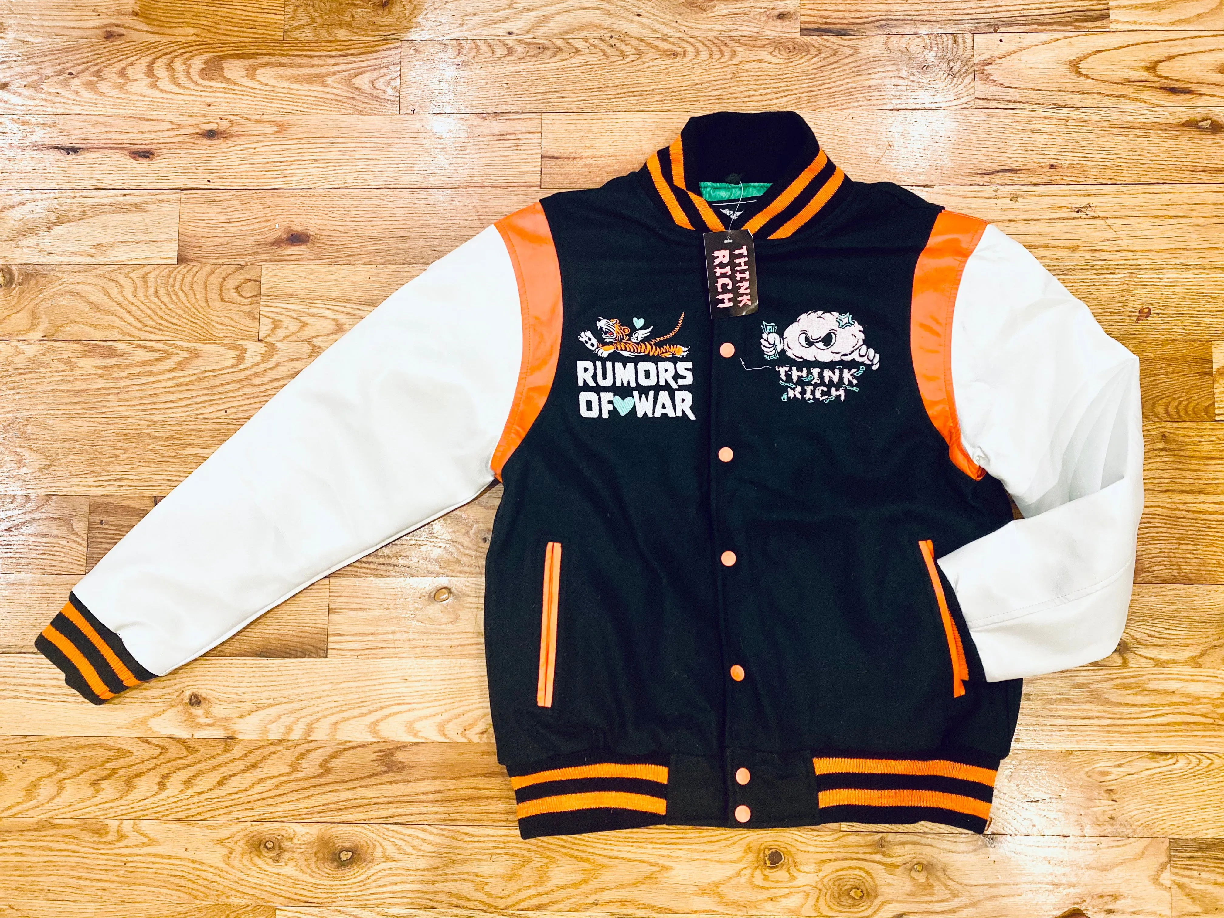 RUMORS OF WAR THINK RICH VARSITY JACKET